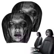 Pair of universal scary face car headrest covers on front seats